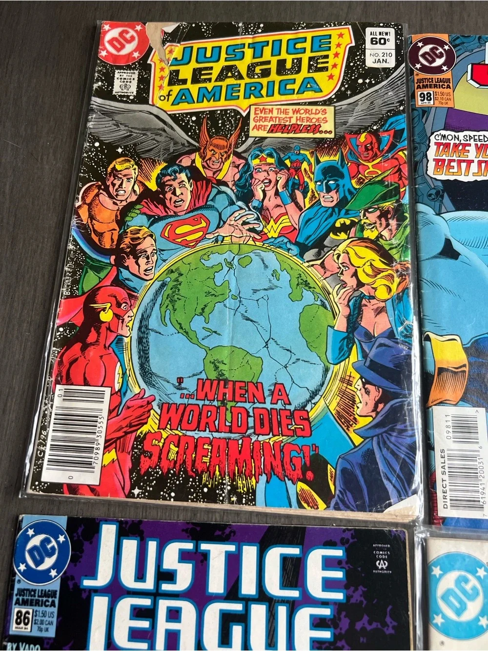 DC Comics Justice League of America Comic Covers - Red, Blue, Black, Yellow
